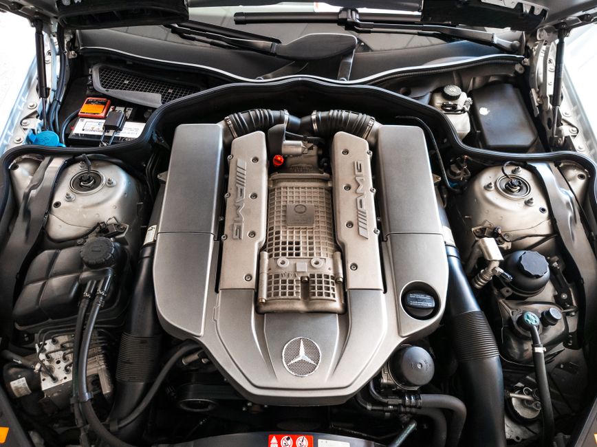 Detailed view of a high-performance car engine revealing intricate components and engineering.